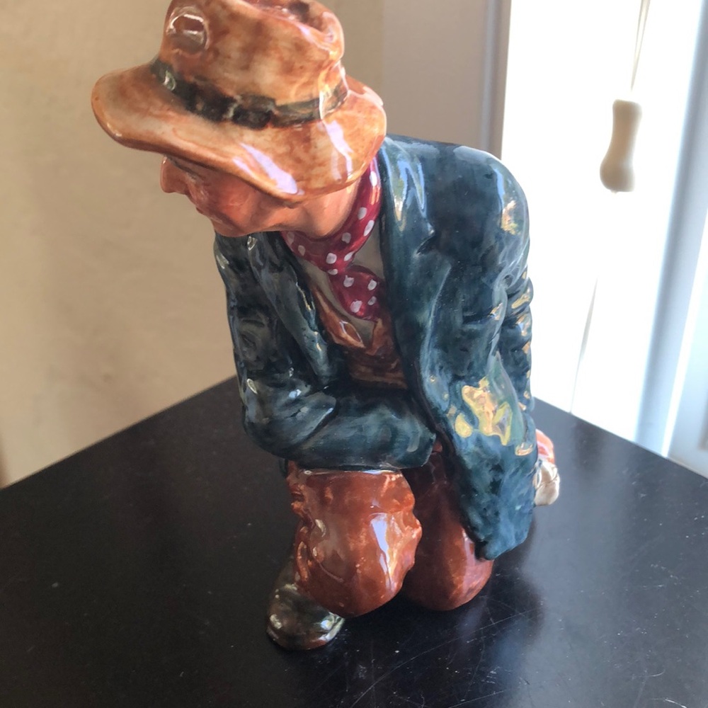 Royal Doulton figurine “The Poacher”